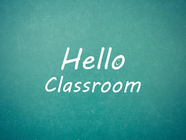 Textura de pared de pizarra verde con una palabra Hello Classroom —  Fotos de Stock