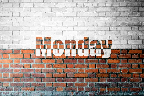 Red Brick wall textur med ett ord måndag — Stockfoto