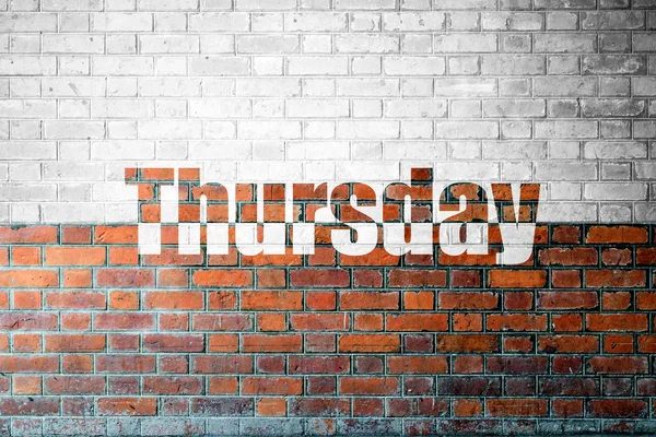Red Brick wall textur med ett ord torsdag — Stockfoto