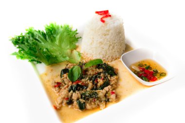 Kızarmış domuz eti ve fesleğenli pilav.