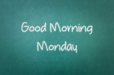 Green blackboard wall texture with a word Good Morning Monday