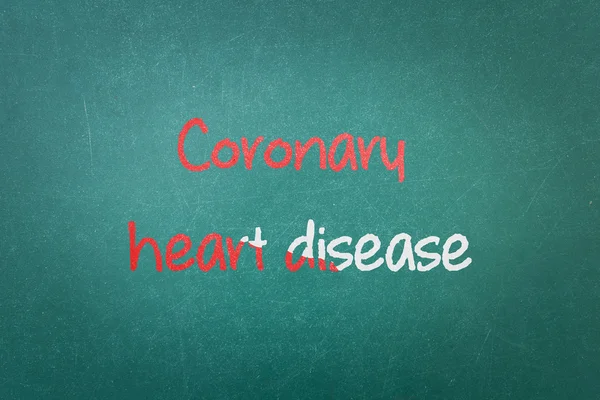 Yeşil yazı tahtası duvar doku bir kelime koroner kalp hastalığı ile — Stok fotoğraf