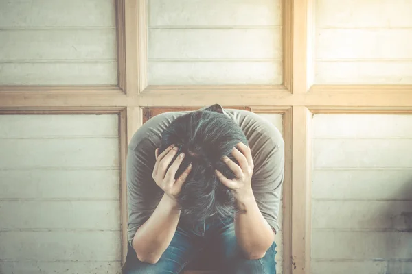 Anxious man on chair , vintage style — Stock Photo, Image