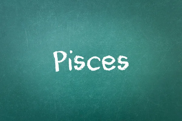 Green blackboard wall texture with a word Pisces — Stock Photo, Image