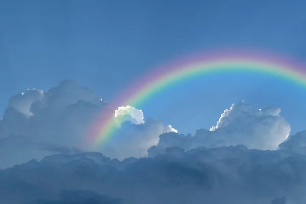 Blue sky with rainbow — Stock Photo, Image
