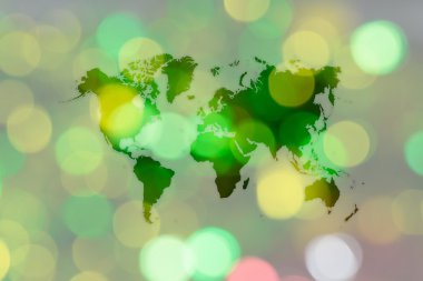 Soyut bokeh arka planını Dünya Haritası ile Noel ağacı