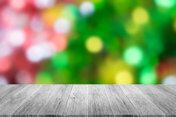 Träterrass och suddig av abstrakt bokeh bakgrund av julstämning — Stockfoto