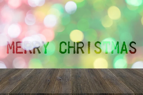 Houten terras en abstracte bokeh achtergrond van kerstboom — Stockfoto