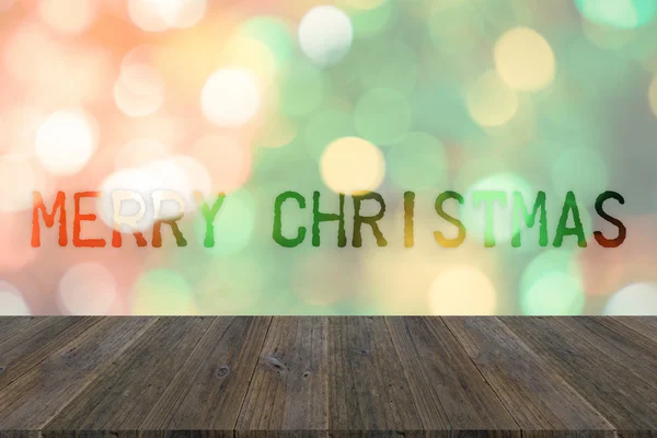 Holzterrasse und abstrakte Bokeh Hintergrund des Weihnachtsbaums — Stockfoto