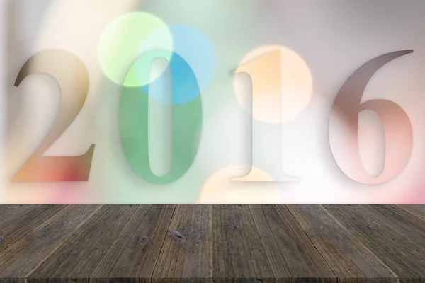 Träterrass och abstrakt bokeh bakgrund av julgran 201 — Stockfoto