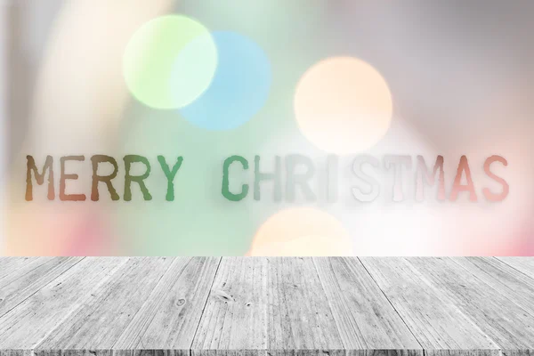 Wood terrace and Abstract bokeh background of Christmas tree — Stock Photo, Image