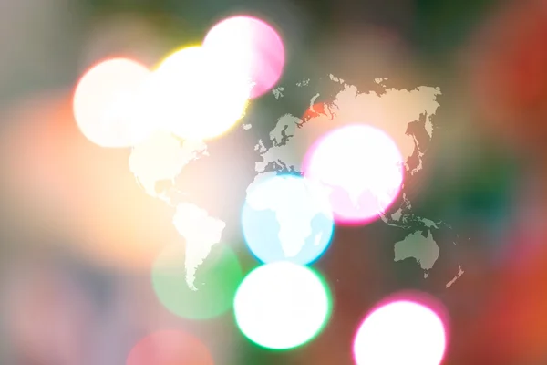 Resumen bokeh fondo del árbol de Navidad con mapa del mundo — Foto de Stock