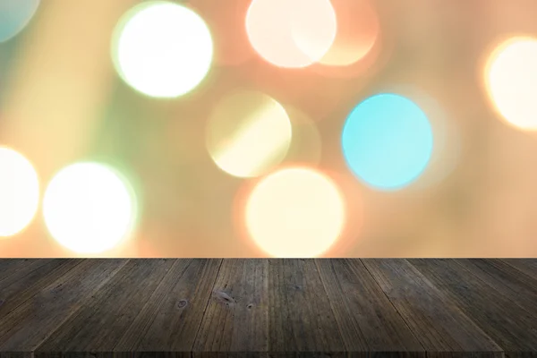 Träterrass och suddig av abstrakt bokeh bakgrund av julstämning — Stockfoto