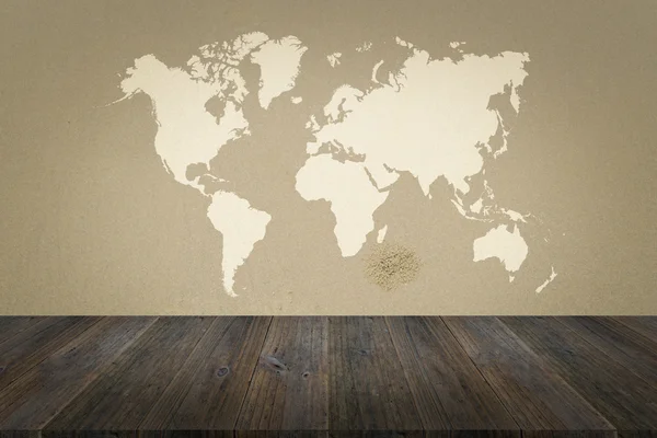 Sand texture surface with Wood terrace and world map — Stock Photo, Image