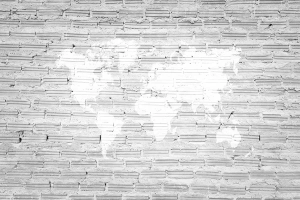 Текстура стены из красного кирпича с картой мира — стоковое фото