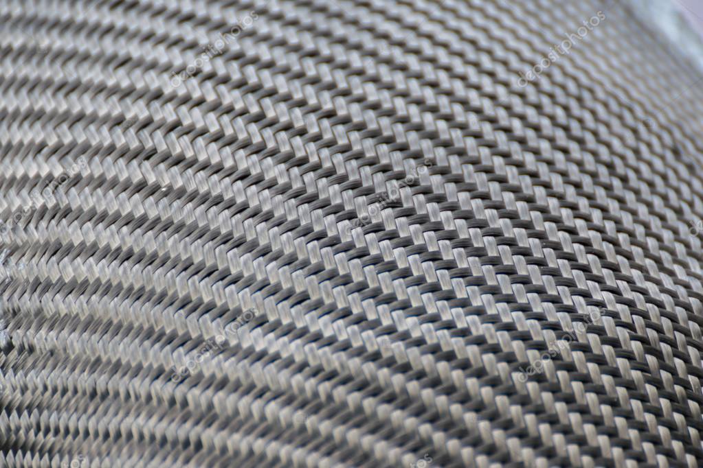 Wrapping carbon fiber or kevlar Stock Photo by ©PongMoji 97264052