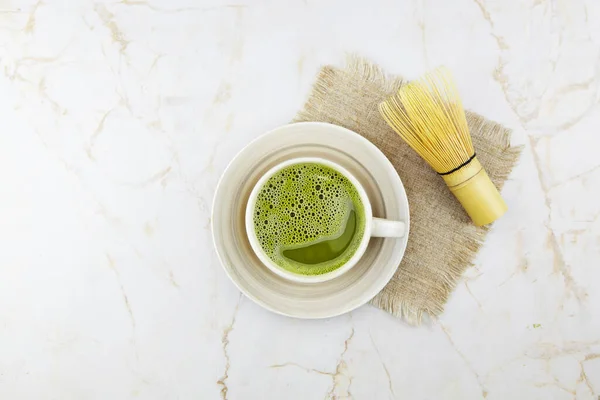 Matcha tea drink on light background. The concept of the Japanese tea ceremony. . High quality photo