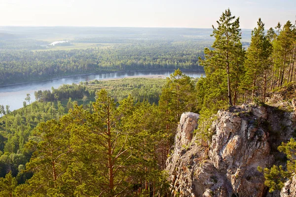 Beautiful view from the cliff to the rocks, forest, river on a summer day. — Stock Photo, Image