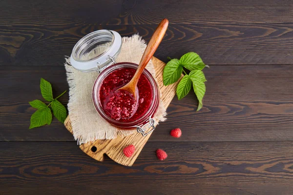 Raspberry Jam Glass Jar Dark Wooden Background Conservation Summer Harvesting — Stock Photo, Image