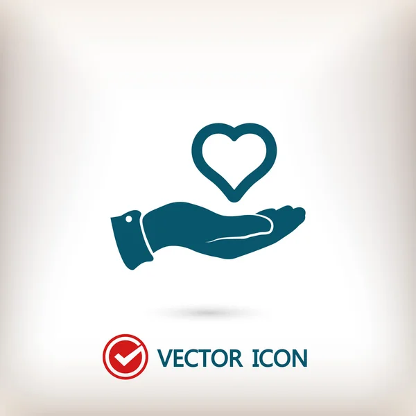 Corazón en la mano icono — Vector de stock