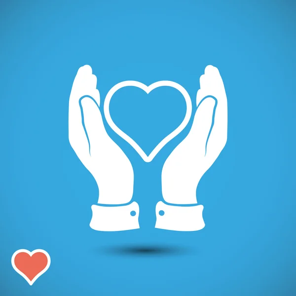 Heart in hands icon — Stock Vector