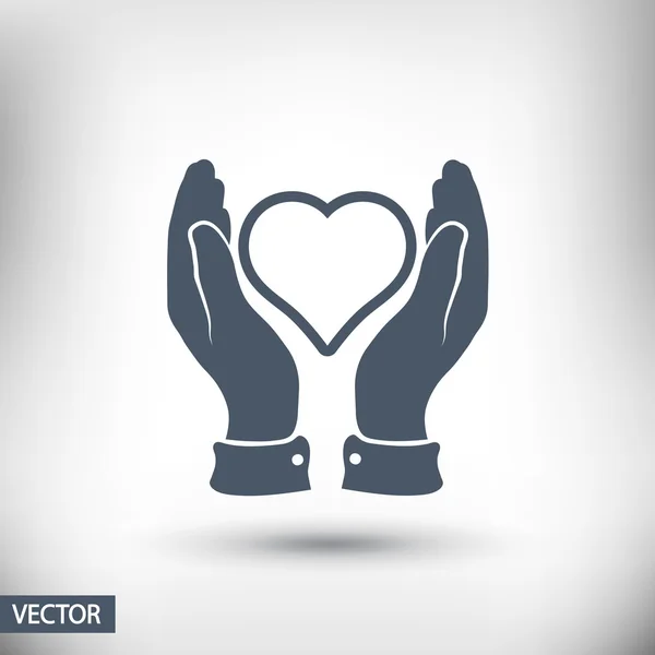 Heart in hands icon — Stock Vector