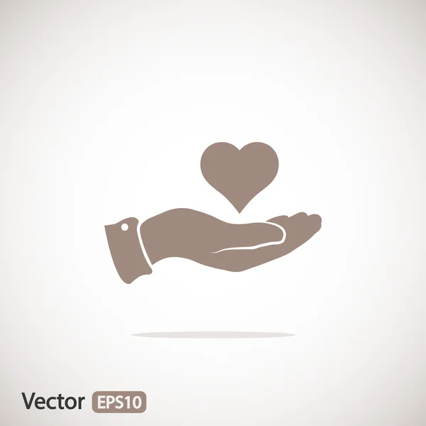 Corazón en la mano icono — Vector de stock