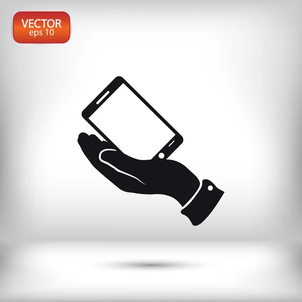 Smartphone en el icono de la mano — Vector de stock