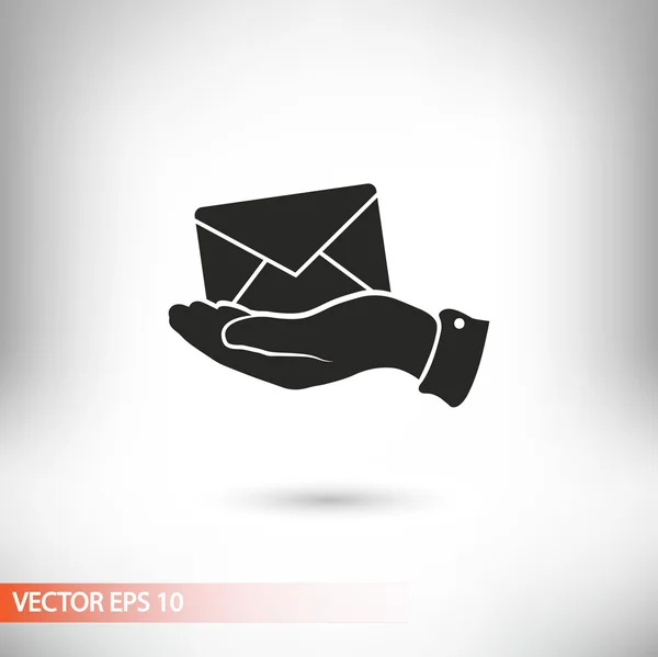 Иконка электронной почты в руке — стоковый вектор