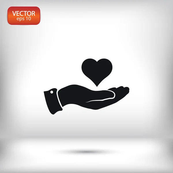 Corazón en la mano icono — Vector de stock