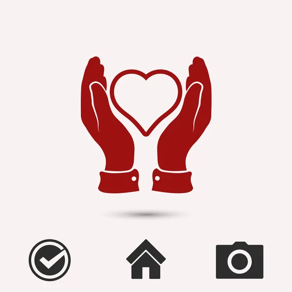 Heart in hands icon — Stock Vector