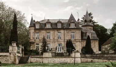Classic french castle in Paris region, touristic landmark clipart
