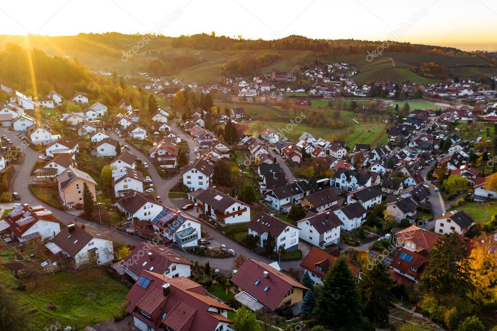 Colorful landscape aerial view of little village Kappelrodeck in Black Forest mountains. Beautiful medieval castle Burg Rodeck. Germany.