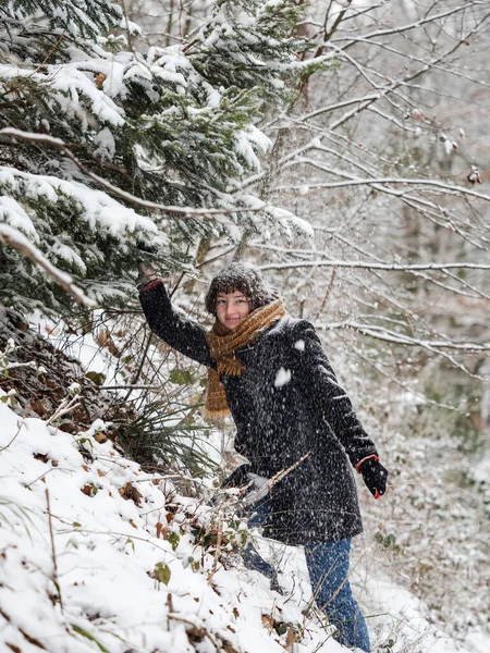 Young Girl Snowy Forest Plays Fresh Snow Snow Falls Trees — Stock Photo, Image