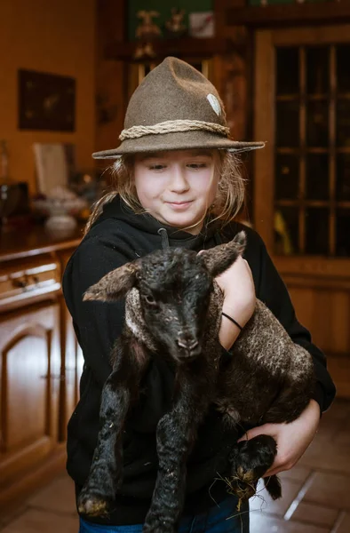 Girl Shepherd Hat Young Newborn Lamb Her Arms — Stock Photo, Image