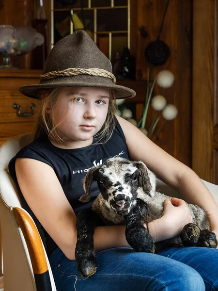 Girl Shepherd Hat Young Newborn Lamb Her Arms — Stock Photo, Image