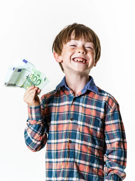 Happy red-haired boy with money — Stock Photo, Image