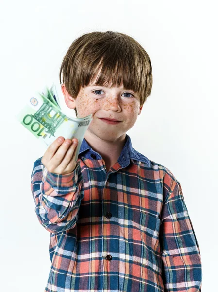 Felice ragazzo dai capelli rossi con i soldi — Foto Stock