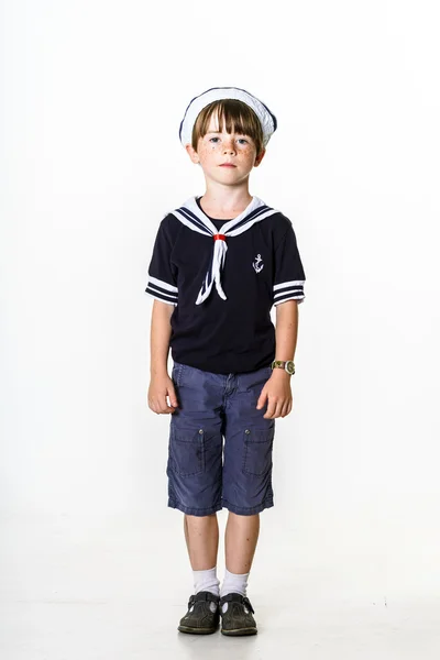 Cute little boy dressed in sailor suit — Stock Photo, Image