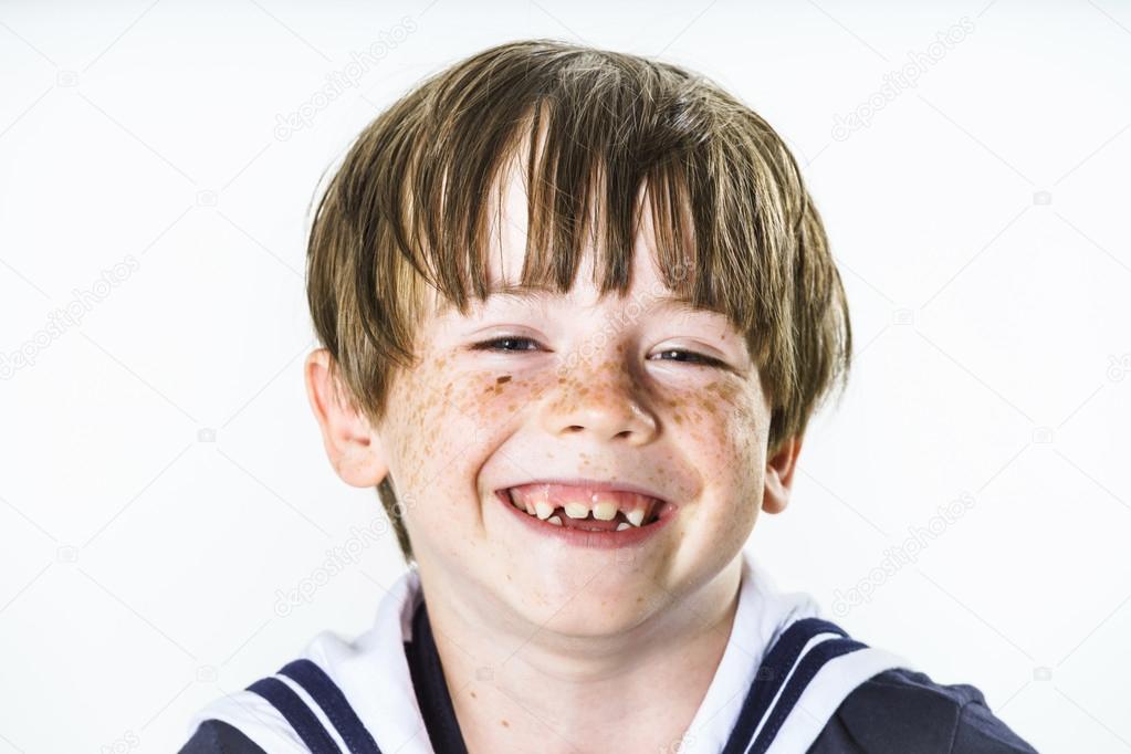 Cute little boy dressed in sailor suit