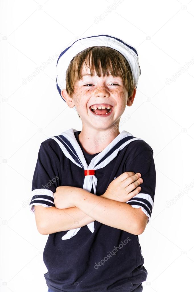 Cute little boy dressed in sailor suit