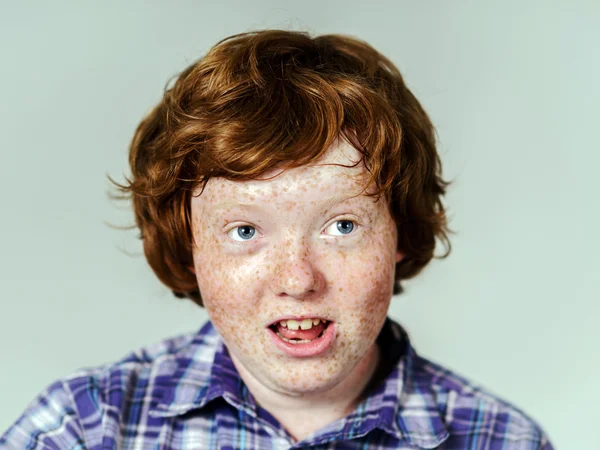 Emotional portrait of red-haired boy — Stock Photo, Image