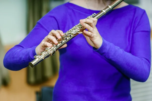 School girl with transversal flute — Stock Photo, Image