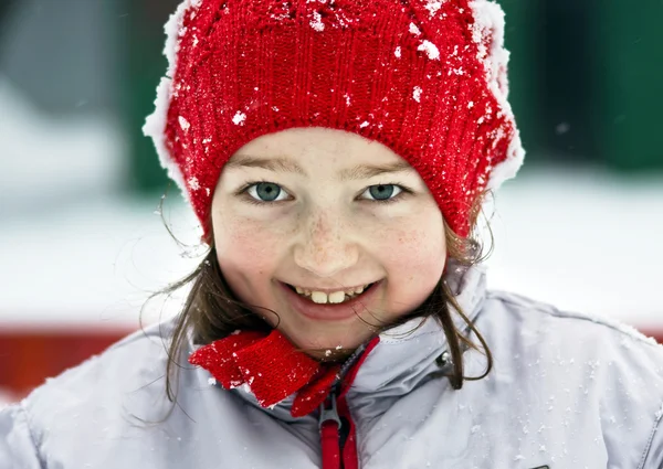 Smiling cute preschooler girl winter portrait — Stock Photo, Image