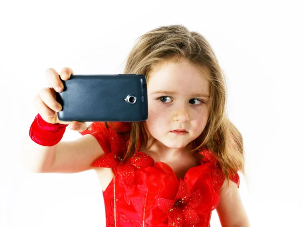 Selfie 写真を撮る赤い服を着てかわいい小さなバレリーナ — ストック写真