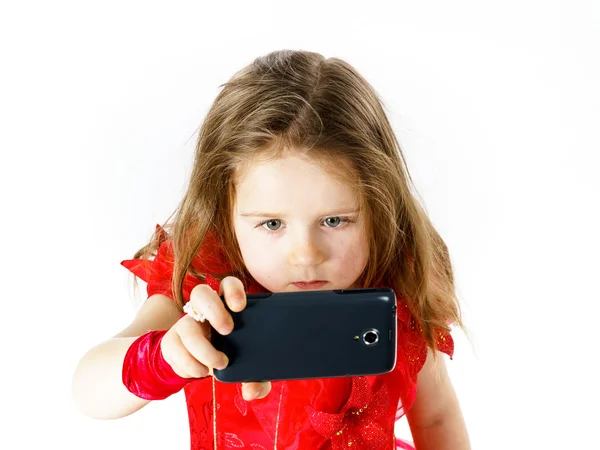 Cute  little ballerina dressed in red  taking a selfie photo — Stock Photo, Image