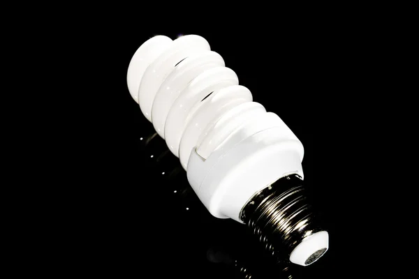 Bright energy saving fluorescent light bulb — Stock Photo, Image