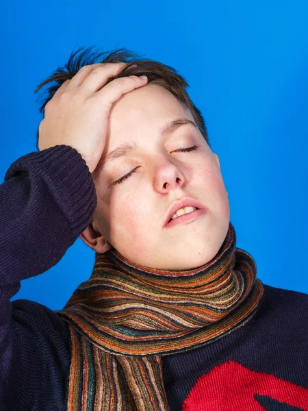 Caucasian ill boy dressed with neckscarf — Stock Photo, Image