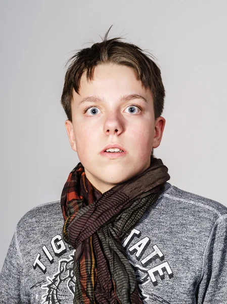 Affective teenage boy portrait in studio — Stock Photo, Image