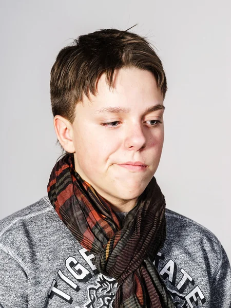 Affective teenage boy portrait in studio — Stock Photo, Image